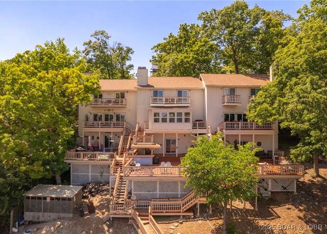 Property at 70 Ravenwood Dr, Lake Ozark, MO 65049, 3 beds, 4 baths