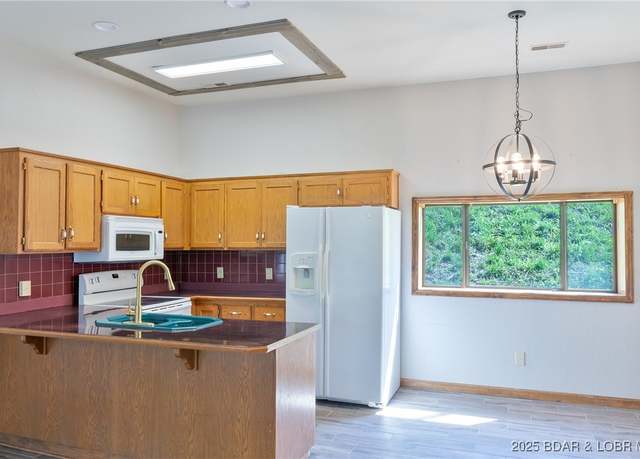 Property at 66 Spring Hill Rd, Sunrise Beach, MO 65591, 3 beds, 2 baths