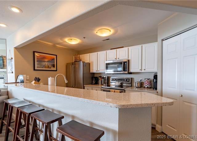 Property at 214 Emerald Bay Dr Unit 1A, Lake Ozark, MO 65049, 3 beds, 2 baths