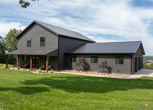 Property at 1275 Bluff Dr, Osage Beach, MO 65065, 5 beds, 4 baths