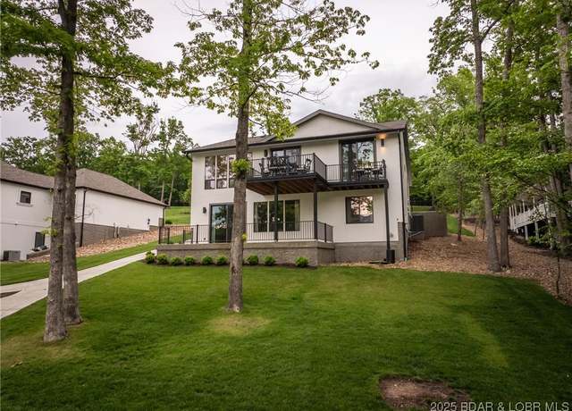 Property at 1165 Muirfield Dr, Porto Cima, MO 65079, 4 beds, 3 baths