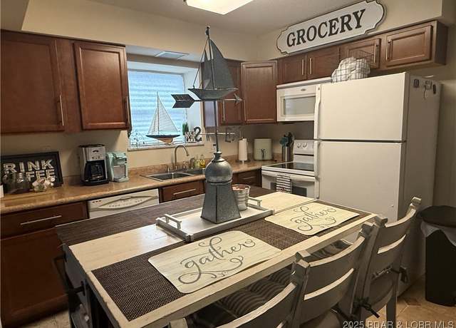 Property at 20 Wheelhouse Ct Unit 2-B, Lake Ozark, MO 65049, 3 beds, 3 baths