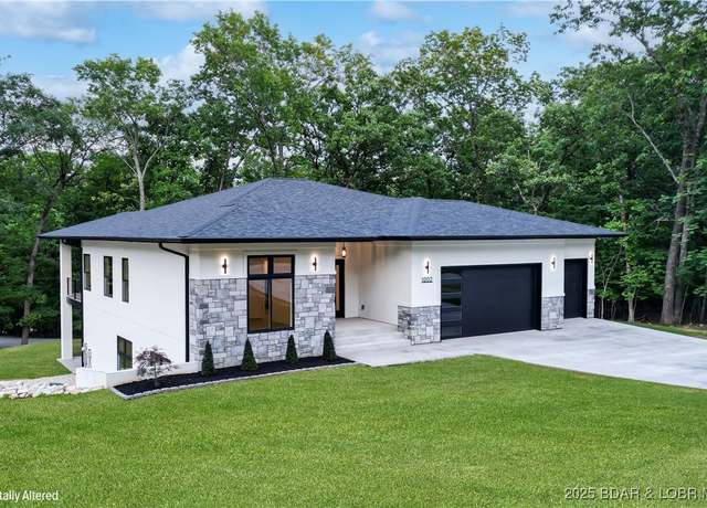 Property at 1002 Grand Point Blvd, Sunrise Beach, MO 65079, 5 beds, 2.5 baths