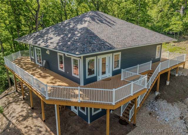 Property at 327 Big Cedar Dr, Camdenton, MO 65020, 4 beds, 4 baths