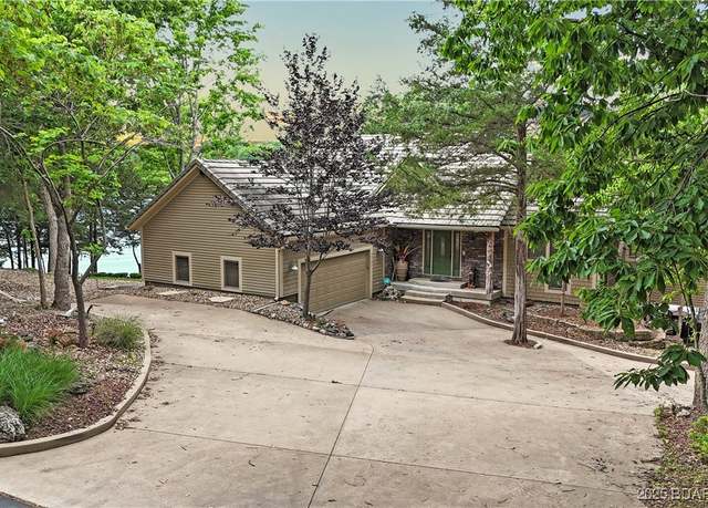 Property at 30061 Gentle Cove Rd, Gravois Mills, MO 65037, 4 beds, 4 baths