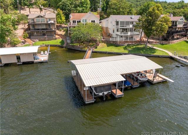 Property at 176 Arbor Oaks Dr, Sunrise Beach, MO 65079, 4 beds, 4 baths