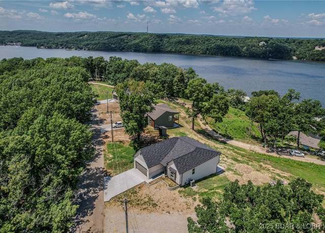 Property at 312 Woodland Pt, Linn Creek, MO 65052, 4 beds, 3 baths