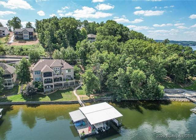 Property at 1163 Beacon Pointe Cir, Lake Ozark, MO 65049, 6 beds, 4 baths