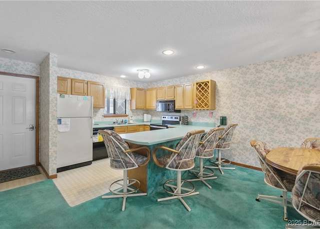 Property at 611 Lazy Days Rd Unit W4, Osage Beach, MO 65065, 5 beds, 3.5 baths