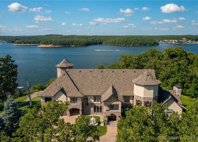 Property at 5211 Dude Ranch Rd, Osage Beach, MO 65065, 7 beds, 6.5 baths