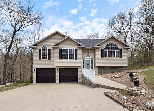 Property at 516 Round Table Dr, Camdenton, MO 65020, 4 beds, 3 baths