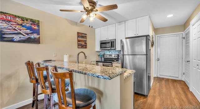 Photo of 875 Parkside Pl Unit D103, Osage Beach, MO 65065