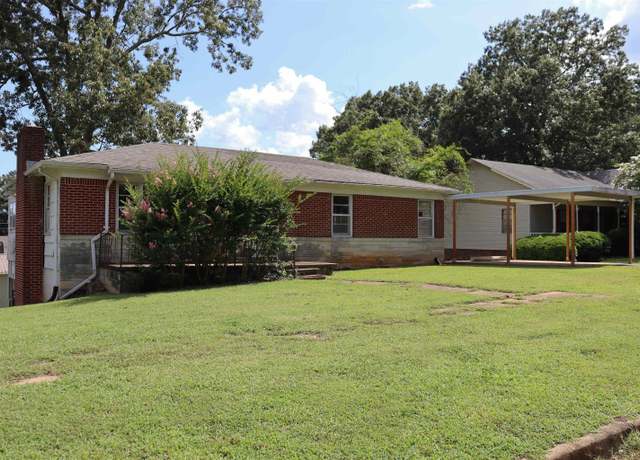 Property at 1514 Oak Grove Blvd, Sheffield, AL, 4 beds, 2 baths