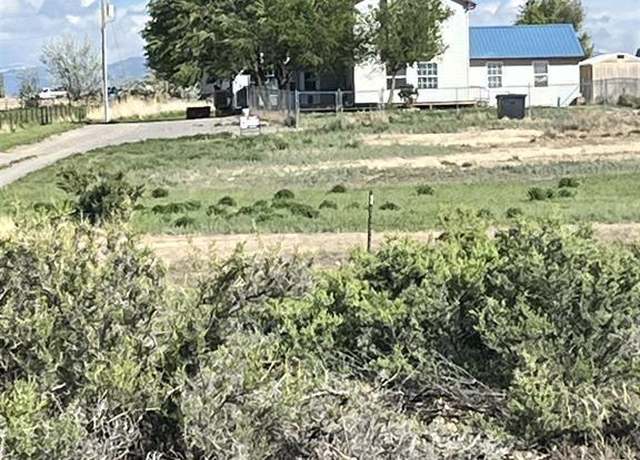 Property at 7062 6150 Rd, Montrose, CO 81401, 6 beds, 3 baths