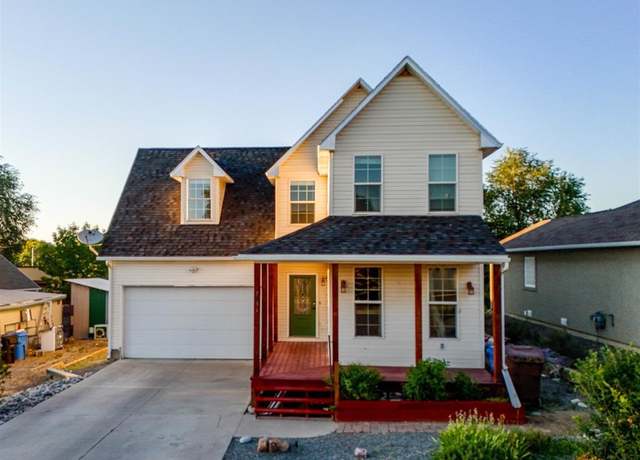 Property at 2031 Cherry St, Montrose, CO 81401, 4 beds, 3 baths