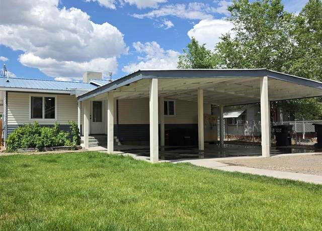 Property at 609 E 4th St, Delta, CO 81416, 4 beds, 3 baths