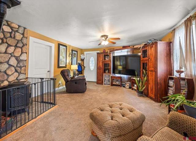 Property at 825 S 1st St, Montrose, CO 81401, 4 beds, 2 baths