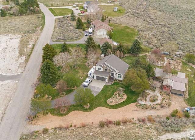 Property at 7130 E Rimrock Dr, Idaho Falls, ID 83401, 4 beds, 3 baths