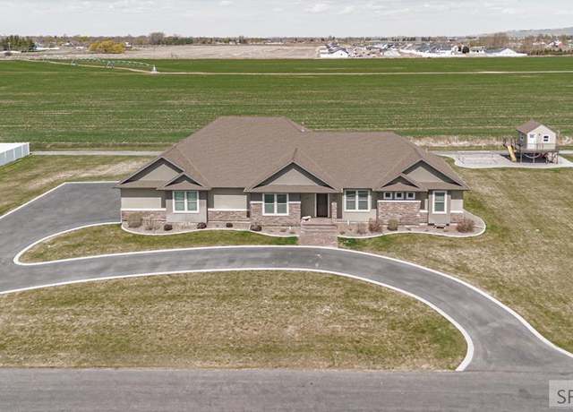 Property at 4677 E Ladyhawk Ln, Ammon, ID 83406, 5 beds, 4 baths