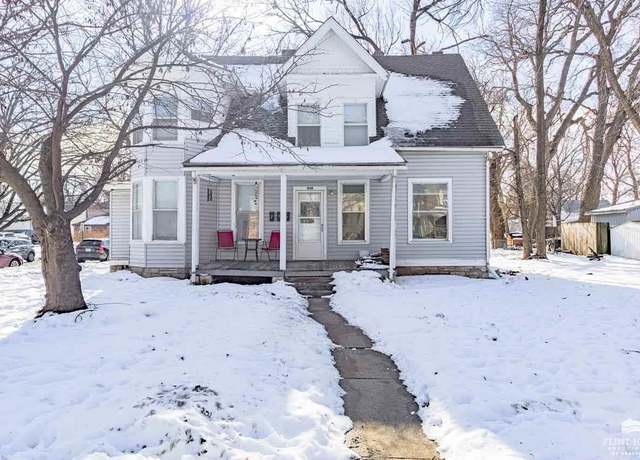 Property at 1001 Fremont St, Manhattan, KS 66502, 4 beds, 3 baths