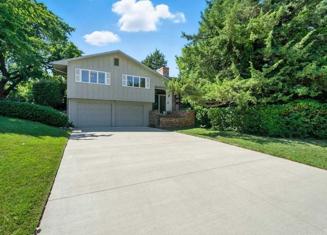 Property at 1621 Denholm DR Dr, Manhattan, KS 66503, 5 beds, 3 baths