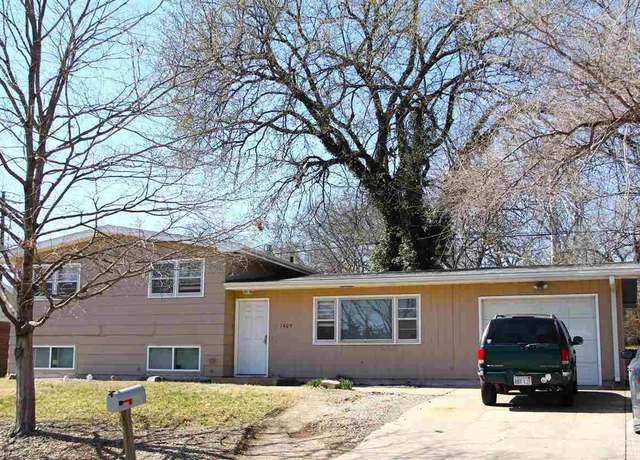 Property at 1409 Jarvis Drive Dr, Manhattan, KS 66502, 4 beds, 2 baths