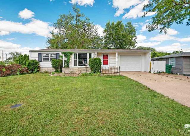 Property at 209 Ridge Drive Dr, Manhattan, KS 66502, 4 beds, 2 baths