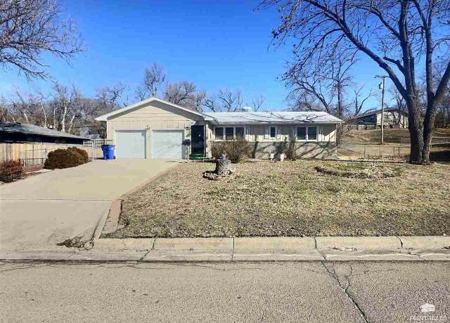 Property at 215 S Eisenhower St, Junction City, KS 66441, 4 beds, 2.5 baths