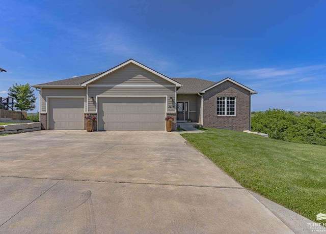Property at 2213 Woodridge Dr, Manhattan, KS 66503, 5 beds, 3 baths