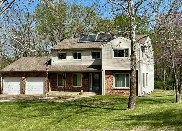 Property at 230 NW 58th St, Topeka, KS 66617, 4 beds, 2.5 baths