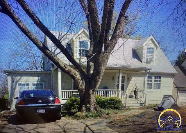 Property at 402 E 14th St, Emporia, KS 66801, 4 beds, 3 baths