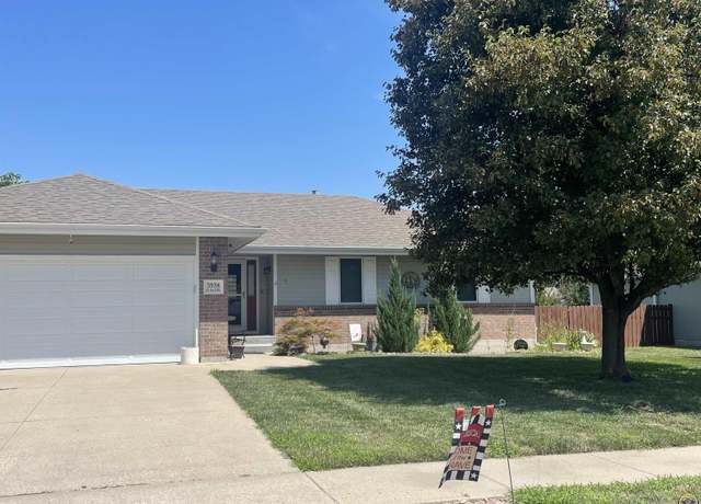 Property at 3938 SW 40th Ter, Topeka, KS 66610, 4 beds, 3 baths