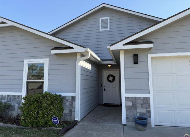 Property at 303 NE Aspen Ln, Topeka, KS 66617, 4 beds, 2 baths