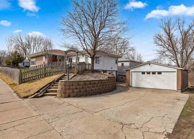 Property at 701 9th Ave, Coralville, IA 52241, 3 beds, 2 baths