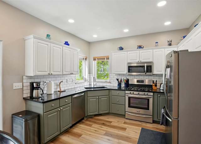 Property at 100 E Dovetail Dr, Coralville, IA 52241, 4 beds, 3.5 baths
