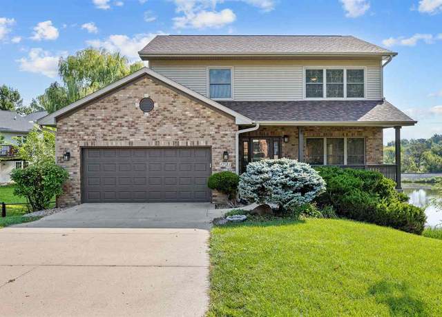 Property at 1721 12th Ave, Coralville, IA 52241, 4 beds, 3.5 baths