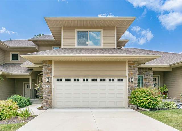 Property at 12 Holiday Ridge Ln, Coralville, IA 52241, 4 beds, 3.5 baths
