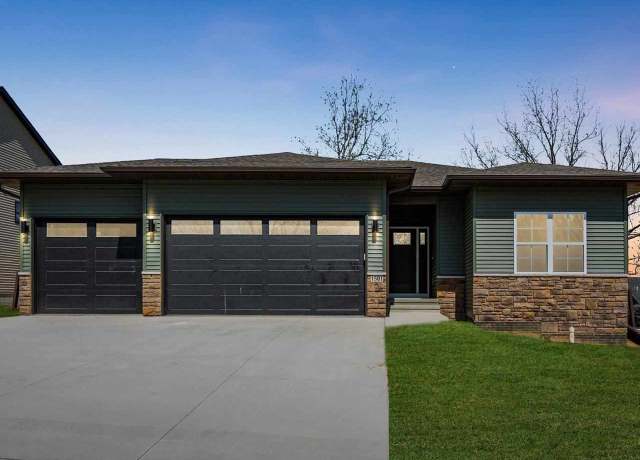 Property at 1501 Legend Dr, Tiffin, IA 52340, 4 beds, 3 baths