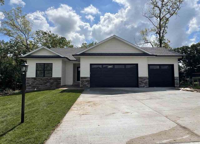 Property at 1502 Legend Dr, Tiffin, IA 52340, 5 beds, 3 baths