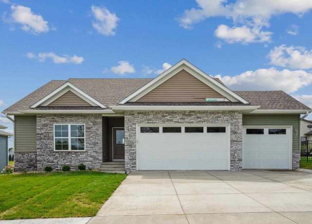 Property at 1223 Covered Wagon Dr, Iowa City, IA 52240, 5 beds, 3 baths