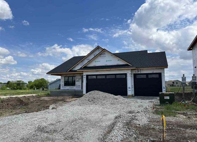 Property at 1289 Covered Wagon Dr, Iowa City, IA 52240, 5 beds, 3 baths