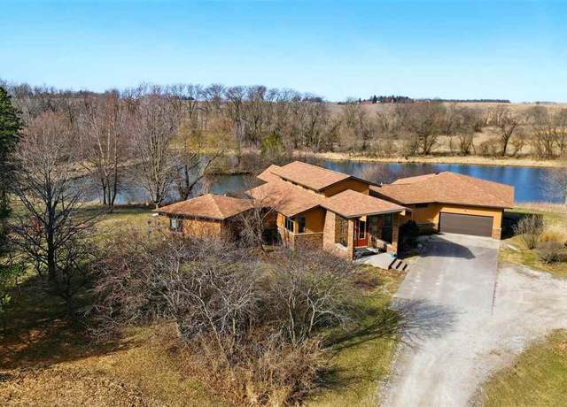 Property at 1330 100th St, West Liberty, IA 52776, 4 beds, 3 baths