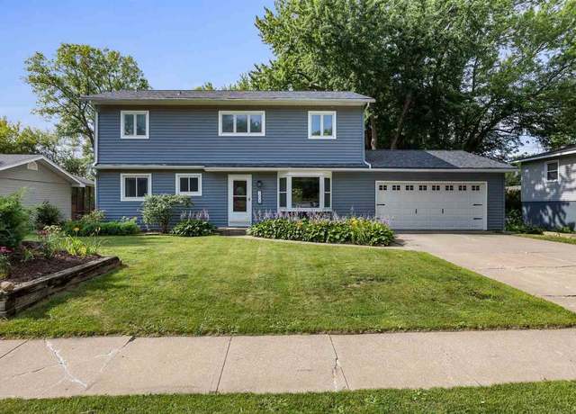 Property at 1608 10th St, Coralville, IA 52241, 5 beds, 3 baths
