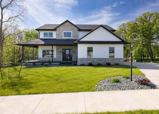 Property at 1504 Legend Dr, Tiffin, IA 52340, 6 beds, 3.5 baths