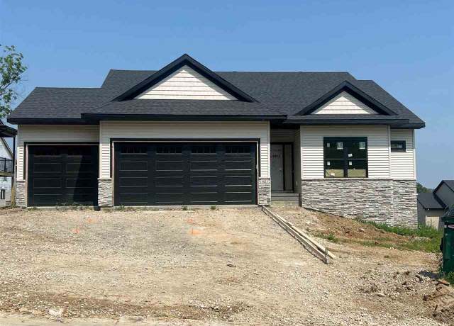 Property at 1421 Legend Dr, Tiffin, IA 52340, 5 beds, 3 baths