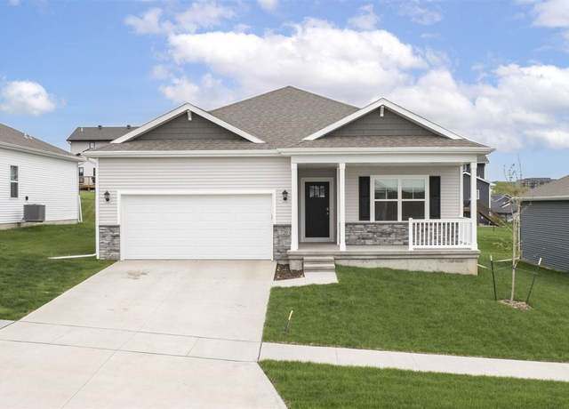 Property at 720 E Bear Dr, Tiffin, IA 52340, 4 beds, 3 baths