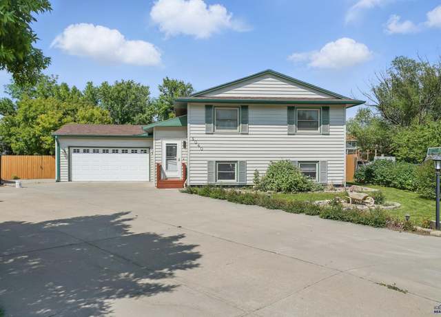 Property at 5040 Saturn Dr, Rapid City, SD 57703, 4 beds, 2 baths
