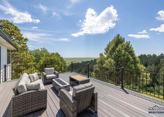 Property at 945 Enchantment Rd, Rapid City, SD 57701, 5 beds, 3 baths