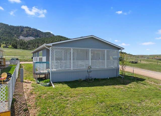 Property at 122 W Lincoln St, Sundance, WY 82729, 3 beds, 2 baths