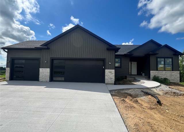 Property at 7608 Country Ridge Dr NW, Cedar Rapids, IA 52405, 5 beds, 3 baths